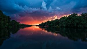 Dusk scenery, river, storm clouds, house, trees, lightning wallpaper thumb