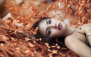 Girl lying on the ground, autumn, leaves wallpaper thumb