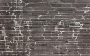 Black small tile wall with streaks wallpaper thumb