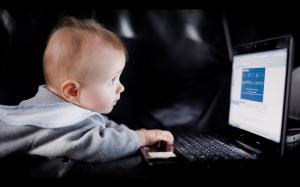 Cute baby boy use laptop wallpaper thumb