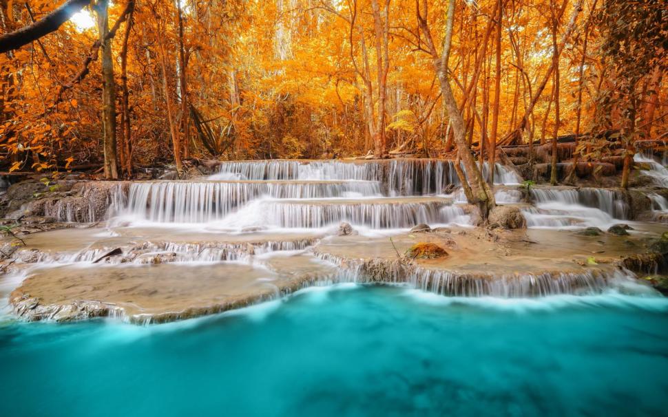 Autumn Forest Trees River Waterfall wallpaper,nature wallpaper,scenery wallpaper,waterfall wallpaper,forest wallpaper,autumn wallpaper,blue water wallpaper,river wallpaper,1680x1050 wallpaper