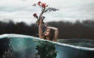 Girl hold up flowers in the water, creative pictures wallpaper thumb