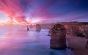 Coast landscape, mountains, rocks, reefs, sunset, purple sky wallpaper thumb
