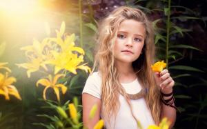 Cute little girl, portrait, yellow flowers wallpaper thumb