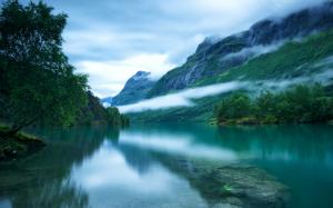 Western Norway, Loen lake surface, Scandinavian mountains, trees, fog wallpaper thumb