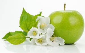 Green apple with apple flowers close-up wallpaper thumb