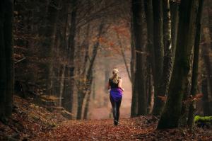 Running girl in fall wallpaper thumb