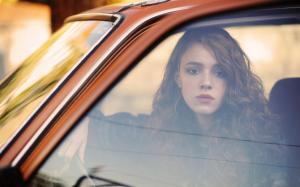 Girl in car, window wallpaper thumb