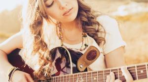 Brown Hair Girl playing Guitar wallpaper thumb