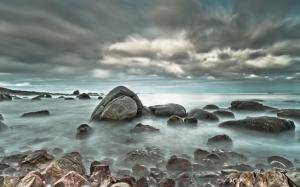 Sea stones clouds wallpaper thumb