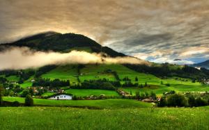 Spring landscape, grass, trees, green, mountains, clouds, houses wallpaper thumb