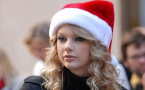 Taylor Swift in christmas cap wallpaper thumb