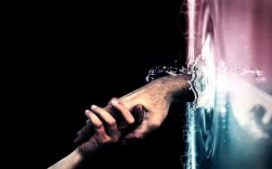 Tight clasped man and woman hands wallpaper thumb
