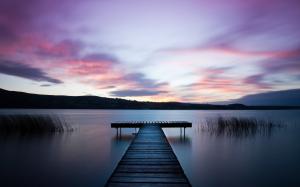 Ireland landscape, river, water surface, wooden bridge, dawn, purple sky wallpaper thumb