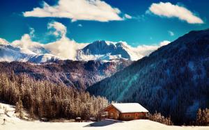 Snowy mountain chalet wallpaper thumb
