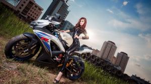 Asian girl and Suzuki GSX-R motorcycle wallpaper thumb