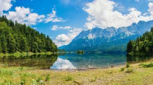Lake, mountains, sky, white clouds, grass, trees, water reflection wallpaper thumb