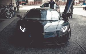 Lamborghini Aventador black supercar front view, door opened wallpaper thumb
