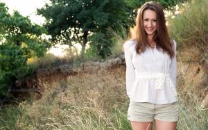 Beautiful brown haired girl, standing, smile wallpaper thumb