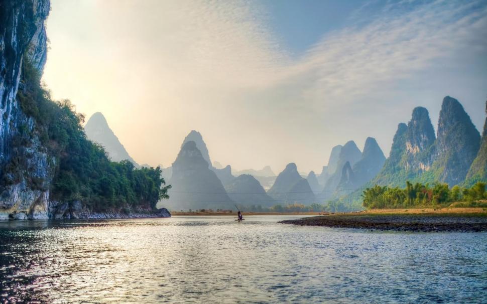 Gorgeous Cone Shaped Mountains Along A River Hdr wallpaper,river HD wallpaper,clouds HD wallpaper,mountains HD wallpaper,boat HD wallpaper,nature & landscapes HD wallpaper,1920x1200 wallpaper