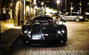 Pagani Zonda F black supercar front view, city, street, night wallpaper thumb