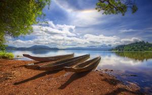 Landscape with wooden boat wallpaper thumb