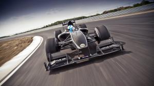 Formula One F1 Race Car Motion Blur Lotus Carbon Fiber HD wallpaper thumb