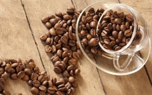 Glass cup with coffee beans wallpaper thumb