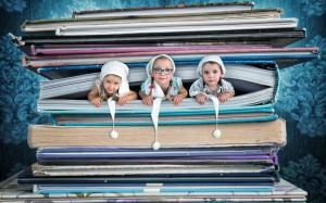 Three cute girls in book, creative pictures wallpaper thumb