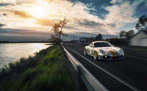 Porsche Cayman supercar, road, river, clouds wallpaper thumb
