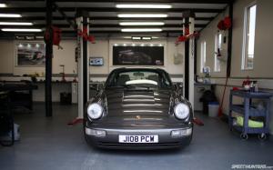 Porsche Garage Lift HD wallpaper thumb