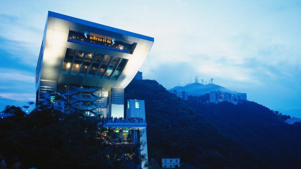Unique Building In The Hills Over Hong Kong wallpaper,forest HD wallpaper,hills HD wallpaper,modern HD wallpaper,building HD wallpaper,nature & landscapes HD wallpaper,1920x1080 wallpaper