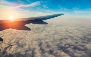 Passenger airplane, aircraft wing, sun, sky, clouds wallpaper thumb