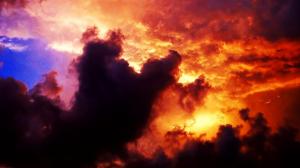 Colorful sunset behind the clouds wallpaper thumb