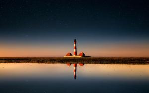 Lighthouse, sky, stars, sea, water reflection wallpaper thumb