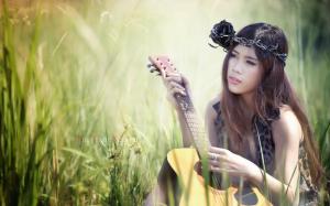 Beautiful asian girl, guitar, music, grass wallpaper thumb
