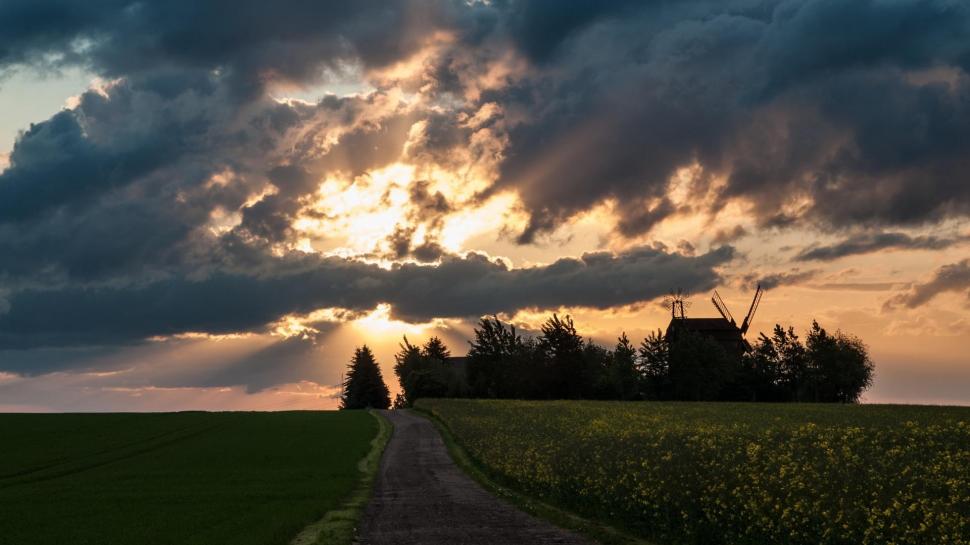 Stormy Clouds Over Sunset Above Windmill wallpaper,wndmill HD wallpaper,farm HD wallpaper,clouds HD wallpaper,sunset HD wallpaper,fields HD wallpaper,nature & landscapes HD wallpaper,1920x1080 wallpaper