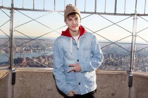justin bieber, singer, celebrity, city, roof, gesture, style wallpaper thumb