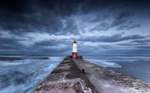 Lighthouse At The End Of A Stone Pier wallpaper thumb