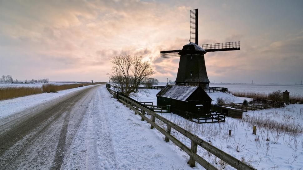 Windmill By A Winter Country Road wallpaper,windmill HD wallpaper,winter HD wallpaper,fence HD wallpaper,sunset HD wallpaper,road HD wallpaper,nature & landscapes HD wallpaper,1920x1080 wallpaper
