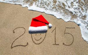 Happy 2015 santa hat on beach wallpaper thumb