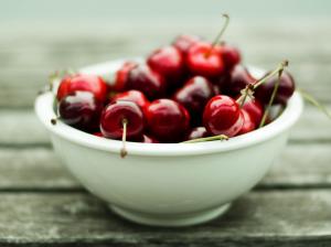 A bowl of delicious red cherry wallpaper thumb