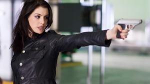 Anne Hathaway,brunettes, women,guns, actresses,models,weapons,celebrity,Get Smart,leather jacket wallpaper thumb