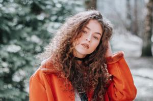face poses women portrait orange jacket seasons makeup model outdoors fashion curly hair glamour wallpaper thumb