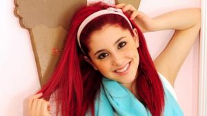 Ariana Grande Playing With Her Red Hair wallpaper thumb
