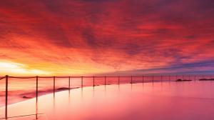 Australia ocean beach, pool, evening sunset, red sky, clouds wallpaper thumb