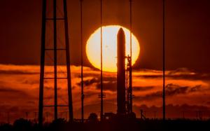 Rocket launching at sunset wallpaper thumb