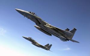 F 15 Eagles Fly Over the Pacific Ocean wallpaper thumb