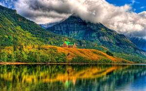 Clouds, mountains, house, forest, trees, lake, water reflection wallpaper thumb