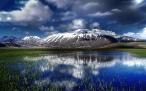 Italy, Sibillini mountains, water, grass, clouds wallpaper thumb